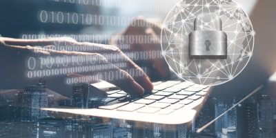 Ransomware,Cyber,Security,Concept,,Double,Exposure,Of,Man,Working,On